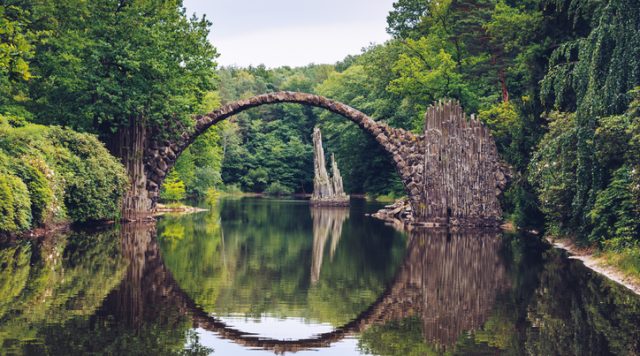 Rakotz bridge (Rakotzbrucke) also known as Devil's Bridge in Kromlau, Germany. Reflection of the bridge in the water create a full circle.
