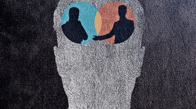 Abstract concrete head with people inside. Teamwork concept