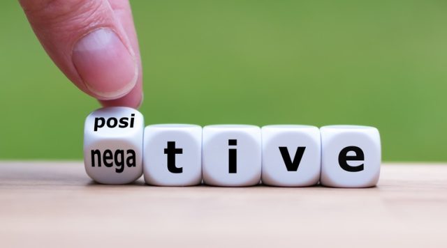 positive over negative