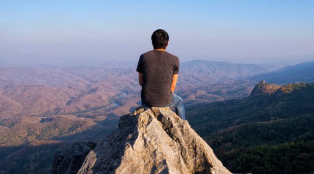sitting on mountain